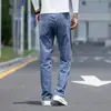 Jeans Masculino Casual Versátil Elástico Solto Tendência Perna Reta para Jovens - Primavera, Outono e Inverno de 2026
