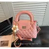 Bolsa de corrente estilo francês com padrão de losangos de nicho para mulheres, nova moda primavera-verão 2026, bolsa de mão pequena para ombro e transversal para o dia a dia