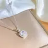 [Set] Elegante conjunto de collar y pendientes de circonita cúbica transfronterizo, diseño de trébol de cuatro hojas, totalmente incrustado de diamantes, joyería versátil y lujosa