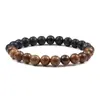 Pulseira Artesanal com Contas de Madeira Natural e Pedra Vulcânica Apresentando Padrões Terrosos Únicos um Presente Perfeito para Qualquer Pessoa que Ame Joias de Estilo Minimalista ou Boêmio Ótima para Uso Casual ou Ocasiões Especiais