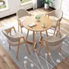 Conjunto de mesa e cadeiras para negociação loja comercial recepção reunião mesa redonda pequena área de descanso simples casual uma mesa quatro cadeiras mesa de jantar