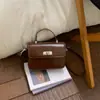 Bolsa de Mão com Textura Retrô Pequena Tote Bag para Mulheres 2026 Primavera Novo Estilo Simples Bolsa Quadrada Pequena de Ombro Único Transversal Bolsa para Celular