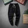 Pantalones de lino para hombre de primavera y otoño, de pierna fina, para jóvenes y de mediana edad, informales, de talla grande, de algodón y lino, rectos y recortados.