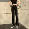 Jeans de mujer estilo coreano de cintura alta, elásticos, ajustados y adelgazantes, con abertura frontal y un ligero bootcut, de largo completo, para Primavera/Verano 2026