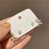Pendientes de flor de perla coreanos estilo TikTok para mujer, lujo ligero, alta gama, nicho, versátiles, elegantes, populares