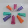 Frasco aplicador de plástico colorido de 5g para cosméticos para creme para as mãos, creme para os olhos, amostra de gloss labial, frasco vazio para apertar