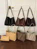 Bolsa de palha trançada estilo vintage coreano com textura única, bolsa de ombro e de axila simples e de nicho para o verão de 2026