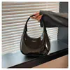Primavera 2025 Nuevo Popular Angora Borgoña Charol Bolso de Mano de Gama Alta Textura Bolso de Mujer Forma de U Bolso Dumpling