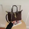Bolso para Mujer 2026 Nuevo Modelo Nicho Rayas Mezclilla Forma de Dumpling Retro Simple Bolso de Mano Gran Capacidad Bolso de Hombro