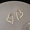 Pendientes de estilo coreano con personalidad de amor simple, ligeros, lujosos, de nicho y temperamento, con un diseño avanzado y sentido del humor.