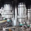 Equipamento de Linha de Produção Totalmente Automática para Enchimento de Água Mineral e Água Pura Três-em-Um de Guangdong