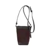 Bolso de mano retro de gamuza para mujer para otoño e invierno, nuevo bolso tipo cubo elegante y versátil 2026, bolso cruzado casual de nicho para el día a día