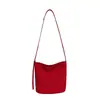 Bolsa feminina pequena transfronteiriça 2026 novo modelo, bolsa saco em tecido Oxford super popular, bolsa de ombro e transversal versátil casual e estilosa