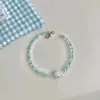 Pulsera de Concha y Caracola Estilo Resort Costero Nuevo Estilo con Cuentas Apiladas, Alto Valor Estético, Versátil, Joyería Femenina Suave y Elegante