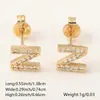 Novas joias femininas 26 brincos de letra inglesa brincos de zircônia microincrustada em cobre brincos de temperamento da moda fornecimento por atacado