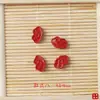 Accesorios de cinabrio de mineral crudo natural arena roja de alto contenido trébol de cuatro hojas Xiangyun carácter pequeño fu accesorios de cinabrio DIY joyería