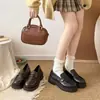 Zapatos de cuero estilo uniforme JK británico para mujer, nuevos populares de otoño 2026, mocasines de suela gruesa, zapatos slip-on versátiles