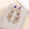 Elegantes pendientes con borlas de flores, aguja de plata s925, largos, chapados en oro de 18 quilates, elegantes pendientes para mujer, moda de alta gama, nuevos