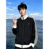 Chamarra deportiva para hombre con bloques de color de tres rayas y cuello alto, sudadera deportiva de moda para otoño con cierre, prenda exterior corta estilo americano para pareja