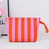 Bolso de punto a rayas transfronterizo, bolsa de almacenamiento para cosméticos, bolso tejido moderno y simple, bolso de mano con cremallera de tejido de punto volador