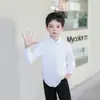 Camisa de manga larga de una sola pieza de color liso para niños, cárdigan infantil de botones, prenda exterior de manga larga con cuello para niños, ropa infantil al por mayor