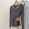 Nuevo estilo otoño e invierno, camiseta de manga larga ajustada estilo coreano con botones, bloques de color patchwork, costuras decorativas, top de diseñador para mujer
