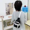 Bolso de Pecho Infantil Moderno y Elegante 2026 Nuevo Modelo para Niños Viajes Fotografía Callejera Bolso Cruzado Pequeño Accesorios para Bebé Bolso de Hombro Comercio Exterior