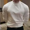 Nueva Camiseta de Algodón Puro de Manga Larga Versátil para Hombre para Otoño e Invierno, Tendencia Ajustada Color Sólido Cuello Semialto Camiseta Base
