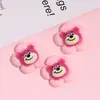 Accesorios de resina de dibujos animados oso fresa alienígena baño DIY accesorios para joyería pegamento de crema parche para funda de teléfono al por mayor