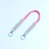 Huayang ofrece cordones de colores tejidos a mano personalizables para teléfono, anti-pérdida, portátiles, con bloques de color, correas de muñeca creativas, venta al por mayor directamente del fabricante