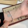 Nueva pulsera de amor con cara sonriente para mujer, diseño de nicho de lujo ligero, sentido de la moda hip hop, pulsera de plata rota, joyería
