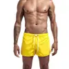 Nuevos pantalones de fitness de verano transfronterizos europeos y americanos para hombre, cómodos, transpirables, de color sólido, para correr, deportes de ocio y entrenamiento.