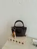 Comércio exterior atacado novo retrô nicho popular bolsa balde textura tecida bolsa de mão para o dia a dia bolsa de ombro única transversal bolsa feminina