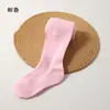 Medias nuevas de primavera y otoño transfronterizas para niños, versátiles para usar como prenda exterior, color liso, rayas verticales, lisas, leggings para niñas, venta al por mayor