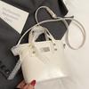 Bolsa de Cubo Portátil Simple de Nicho de Alta Gama de Primavera y Verano de Venta Caliente para Mujer Casual para Viajar que Combina con Todo Estilo Dulce Bolso Cruzado