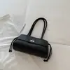 Bolso vintage de lujo ligero de nicho con patrón de diamantes para mujer, nuevo modelo 2026, bolso tipo cubo de alta gama, bolso de mano para el trabajo, moderno y versátil