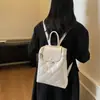 Mochila de moda estilo coreano con bordado acolchado para mujer 2026 Nueva Mochila Simple Gran Capacidad Portátil Bolso para Viajes Cotidianos Tendencia