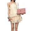 Vestido beige de encaje sin mangas con cuello halter, espalda descubierta, suelto para mujer, nuevo vestido corto de línea A para otoño 2026 con tiras de amarre