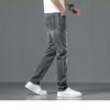Pantalones vaqueros grises claros de verano de alta gama para hombre, marca de moda, pantalones largos casuales elásticos de tubo recto pequeño para jóvenes, 2024
