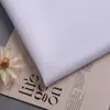 Fábrica de Origen Produce Tela Oxford de Poliéster, Tela de Poliéster 200D, Blanca en Stock, Impermeable, Descuentos por Cantidad