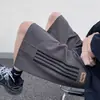 Shorts Masculinos de Verão 2025 Novo Americano Retrô Marca Tendência Patchwork Listrado Versátil Solto Casual Cinco Pontos Esportivo