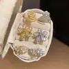 Anillo Ajustable Flor Gota de Agua de Circonita Bañado en Oro Real de 18K Exquisito Anillo de Dedo Índice de Gama Alta Joyería de Moda Personalizada para Mujeres