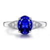 Anel de tanzanita imitação por atacado de fábrica anel de safira e diamante de quatro garras de baixo luxo boca viva diamante completo anel de diamante de cristal azul mulheres