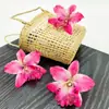 Venta al por mayor de fábrica Venta caliente transfronteriza Flores artificiales Orquídeas tailandesas Sombreros de flores Zapatos con flores Tocados festivos Flores para la cabeza Flores falsas