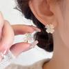 Pendientes de trébol de cuatro hojas con diseño de ojo de gato y explosión de TikTok, pendientes rojos de Internet con diseño único, pendientes clásicos de circonitas de amor exquisitos.