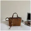 Bolso de Cubo de Mano de Alto Valor para Mujer Otoño 2026 Nuevo Bolso de Hombro Casual Elegante Sensación Relajada Bolso Cruzado Retro