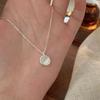 Collar Suiheng S925 Plata Esterlina Redondo Cristal Blanco para Mujer Lujo Ligero Elegante Ópalo Imitación Ojo de Gato Cadena Clavícula Collar de Alta Gama