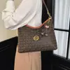 Bolsa de mão de alta qualidade feminina 2026 novo estilo estampa europeia e americana bolsa feminina retrô casual versátil grande capacidade bolsa de ombro único transversal