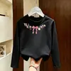 Camiseta de manga larga de algodón puro estilo coreano para niñas, nuevo diseño de dibujos animados de moda otoño 2026, camiseta básica versátil para niños mayores