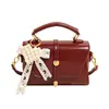 Bolsas Casuais Femininas 2026 Nova Bolsa Transversal Versátil Bolsa de Ombro Único para o Trabalho Bolsa de Mão Retrô de Primavera Bolsa Quadrada Pequena